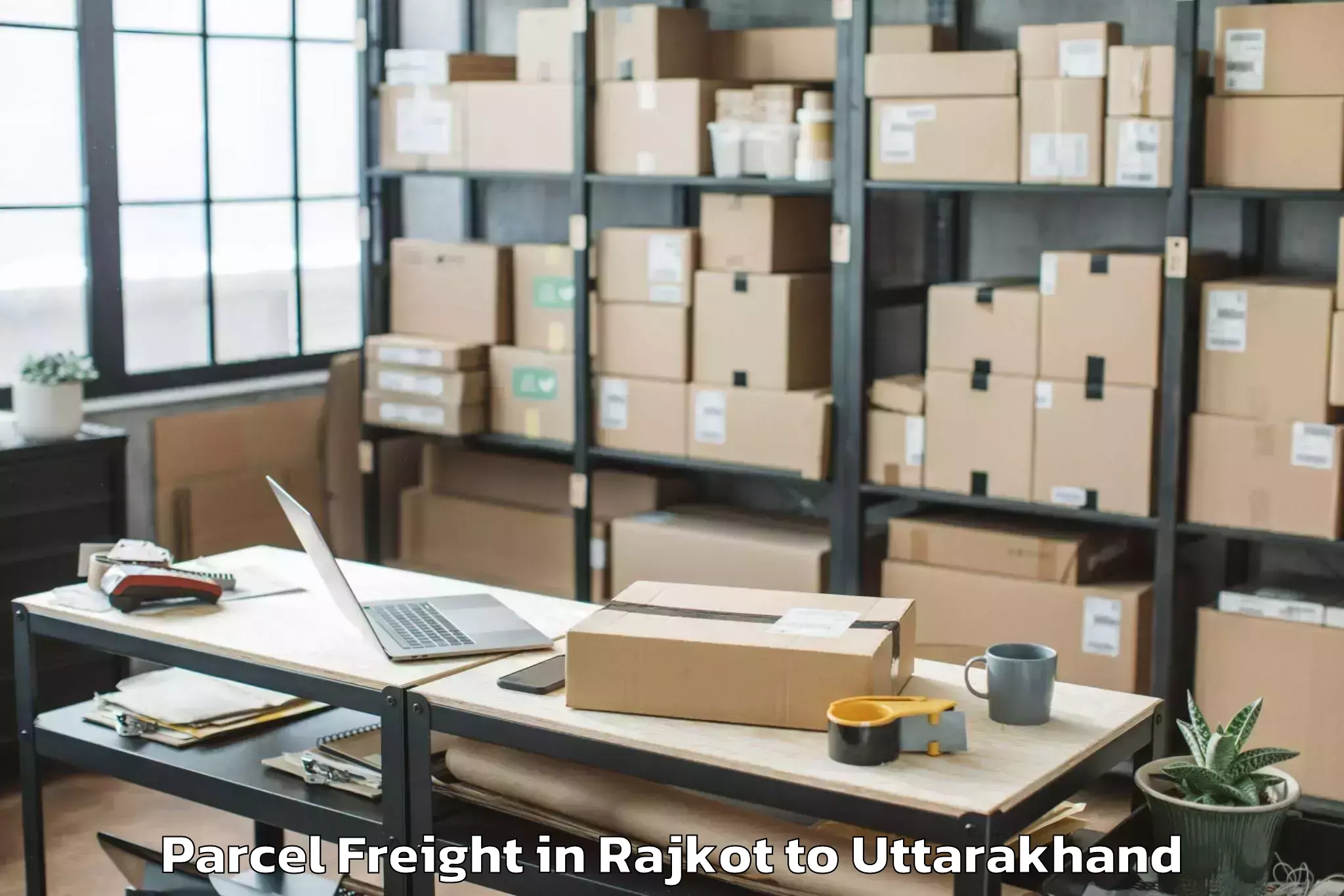 Book Rajkot to Lalkuan Parcel Freight Online